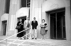 photo shows a group on the steps of the federal courthouse