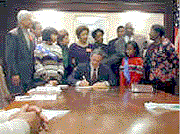 photo of a big signing ceremony